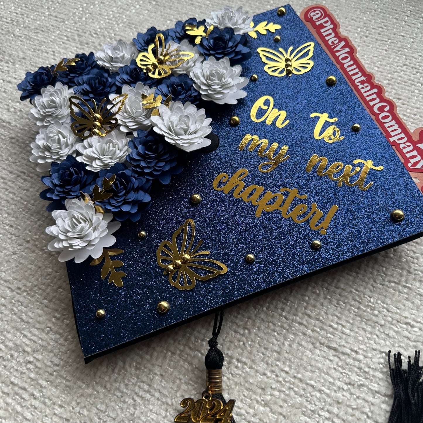 Navy and Gold "On To My Next Chapter" Floral Graduation Cap Topper